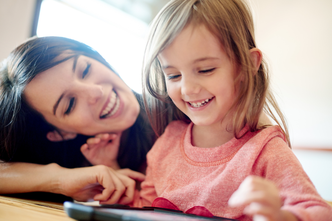 mom and child playing literacy game